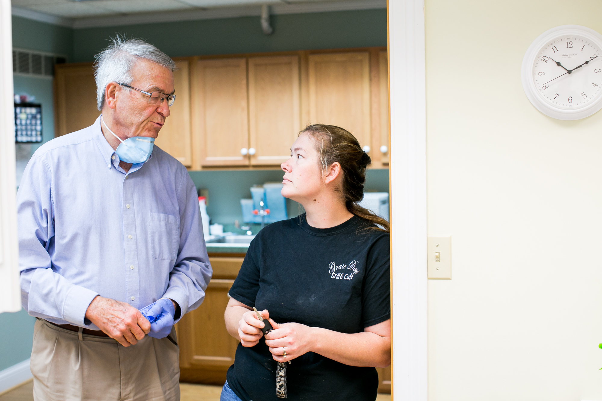 Dr. Kemper interacting with a patient Dr. Kemper interacting with a patient